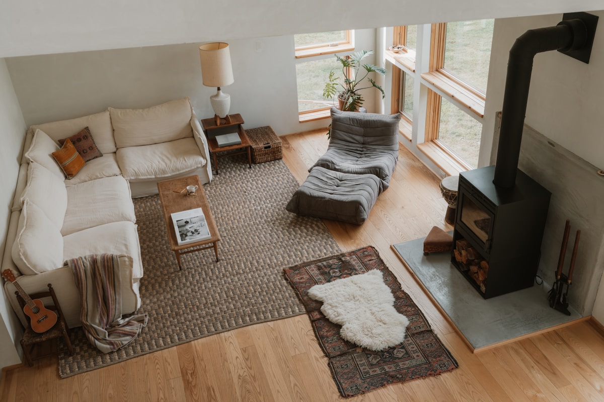 Living room with a cream sofa and wooden furniture